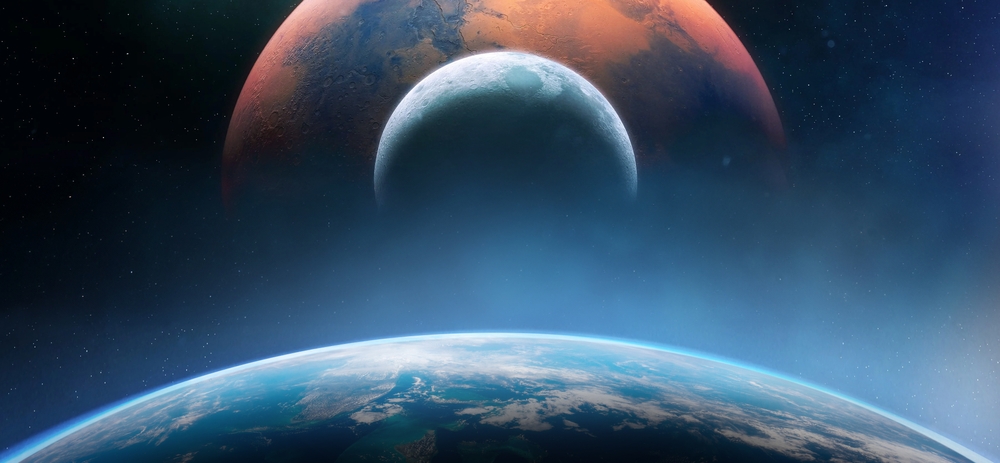 A moon and mars above the planet Earth