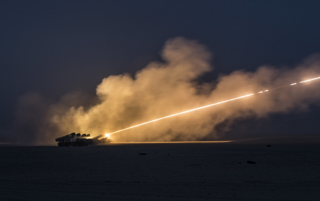 US and Kuwaiti soldiers operate HIMARS and BM-30 Smerch rocket launchers  during an exercise in Kuwait in January 2019
