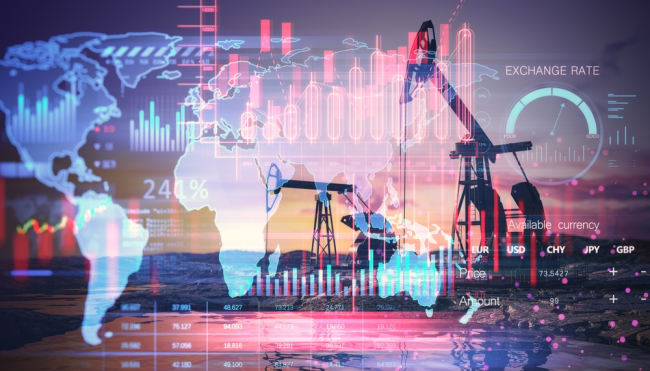 Double exposure of oil rig and digital financial charts, graphs, and diagrams overlaying a world map background