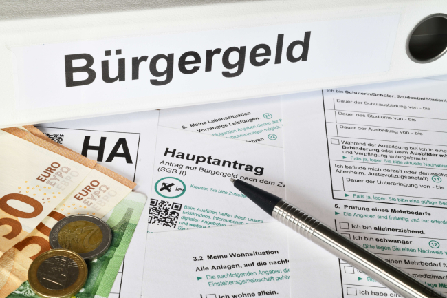 Hamburg, Germany - December 9, 2023: An application form for citizens' money, Germany's new financial support system for the unemployed