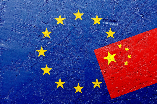 Chinese flag on EU flag background