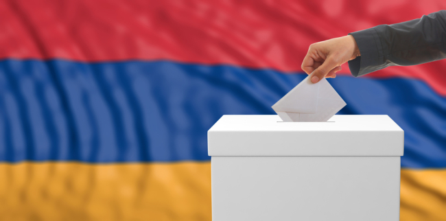 Voter on a waving Armenian flag background 