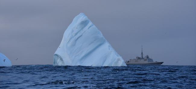The Multi-Purpose Frigate (FREMM) Bretagne sails among the icebergs. North Atlantic Ocean, October 2018.
