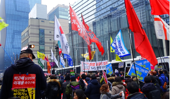 Seoul, South Korea - February 4, 2017: Hundreds of People at Gangnam calling for punishment of president Park Geun-hye and Samsung chief Lee Jae-yong