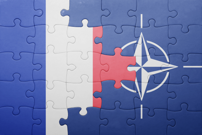 puzzle with the national flag of france and nato