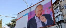 YALTA - MAR 07: Street billboard - Russia's President Vladimir Putin