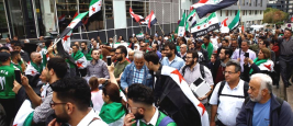 A protest against Syrian President Bashar Assad in Brussels, Belgium on Sept. 8, 2018.