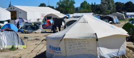 Idomeni/Greece. Inscription on the UNHCR tent in transit refugee/migrant camp