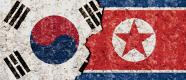 Flags of North Korea and South Korea Credits: Tomas Stehlik for Shutterstock