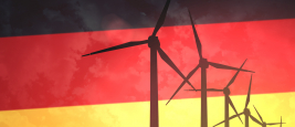 Wind turbines on the background of the flag of Germany