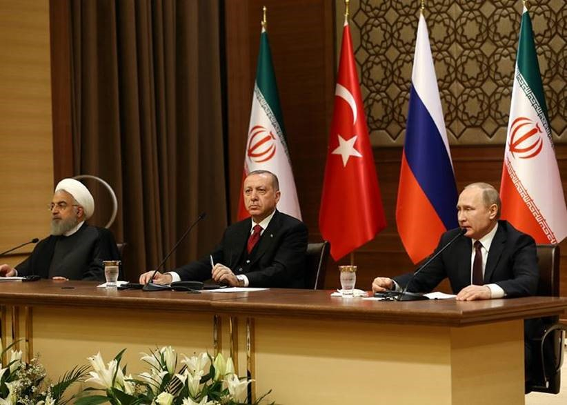 President Recep Tayyip Erdoğan, President of Russia Vladimir Putin and President of Iran Hassan Rouhani at the Presidential Complex in Ankara on April 4, 2018 for a trilateral summit.