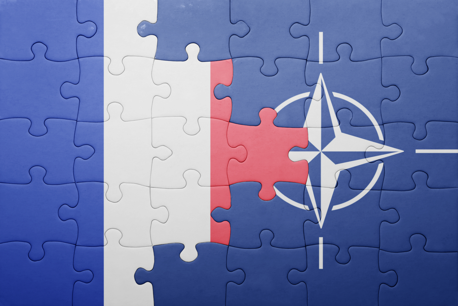 puzzle with the national flag of france and nato
