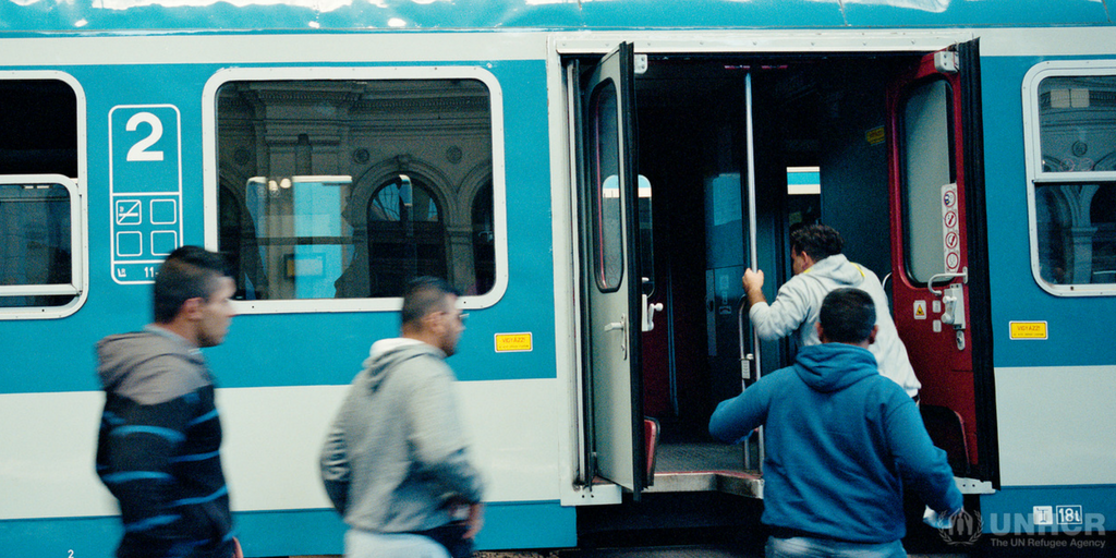 Hungary. Syrian refugees taking the train to Germany © UNHCR/Åke Ericson
